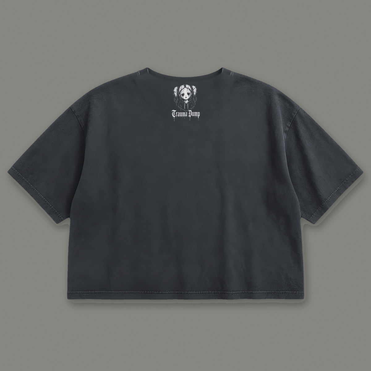 Life is Fragile Cropped Baby Tee in black, back view with doll portrait logo under the collar