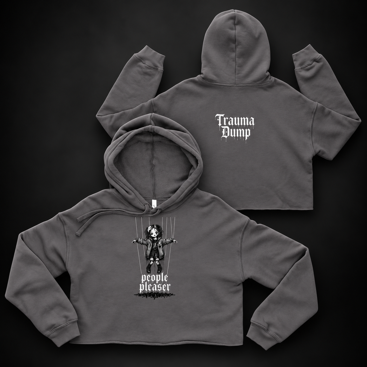 People Pleaser Cropped Hoodie by Trauma Dump, goth cropped hoodie with cut-strings marionette print, mockup view 2 (Storm, white ink)