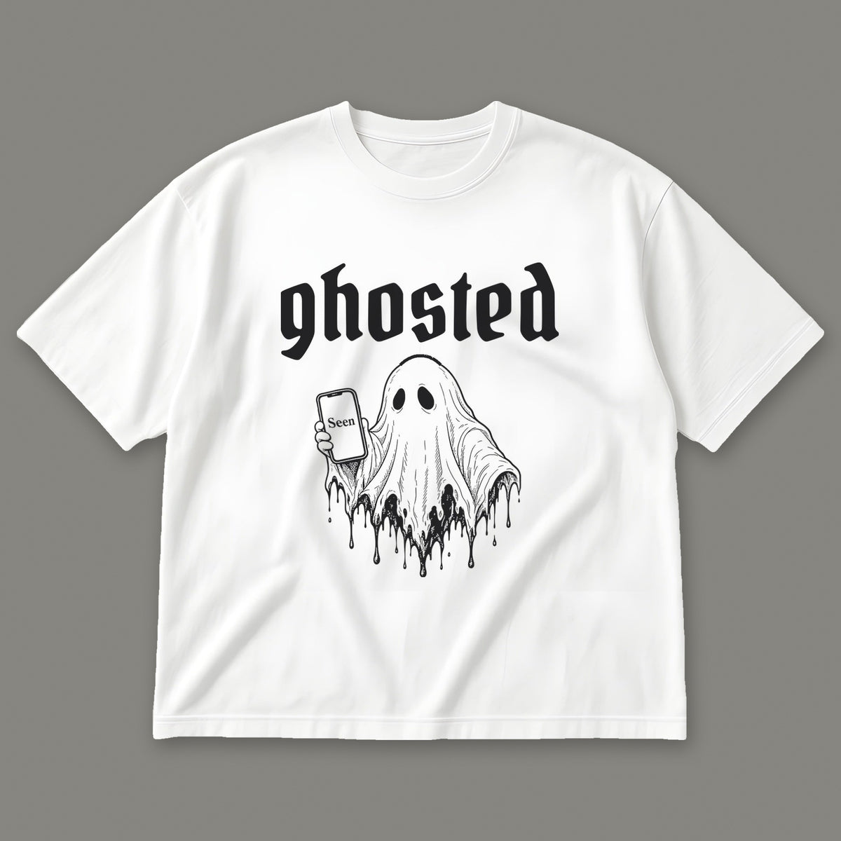 Ghosted Men's Oversized Tee in white by Trauma Dump, little ghost with phone left on read tattoo-style gothic graphic in black ink
