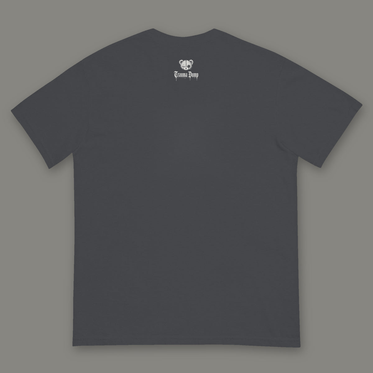 Inner Child Men's Heavyweight Tee back, Trauma Dump bear-head logo under the collar (Graphite, white ink)