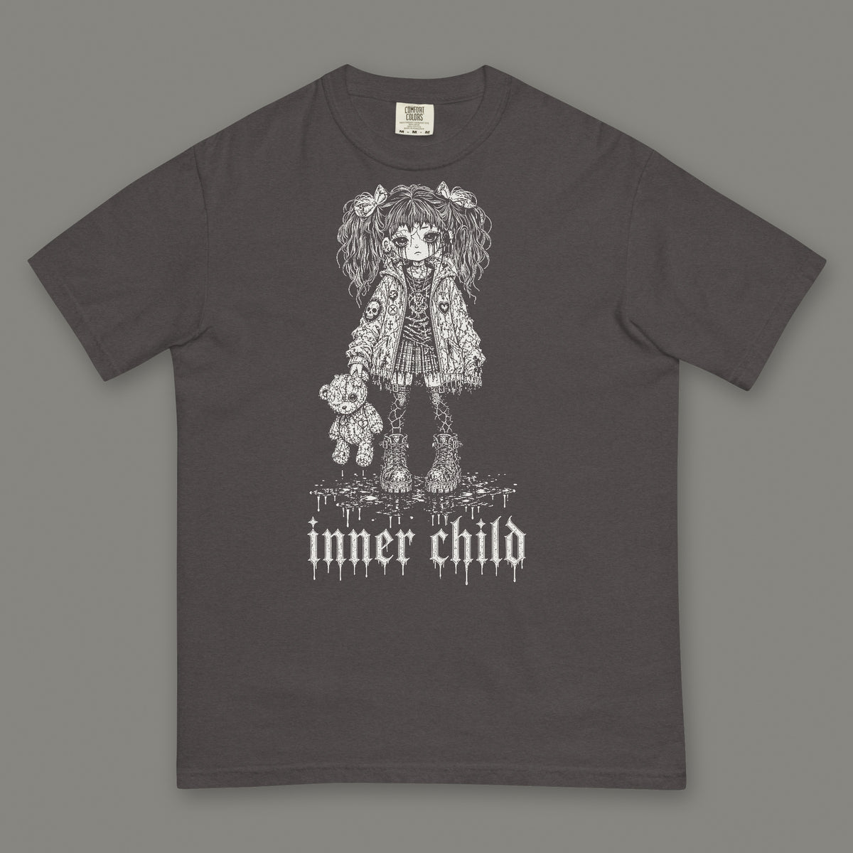 Inner Child Men's Heavyweight Tee in graphite by Trauma Dump, little girl with teddy bear tattoo-style gothic graphic in white ink (Graphite, white ink)