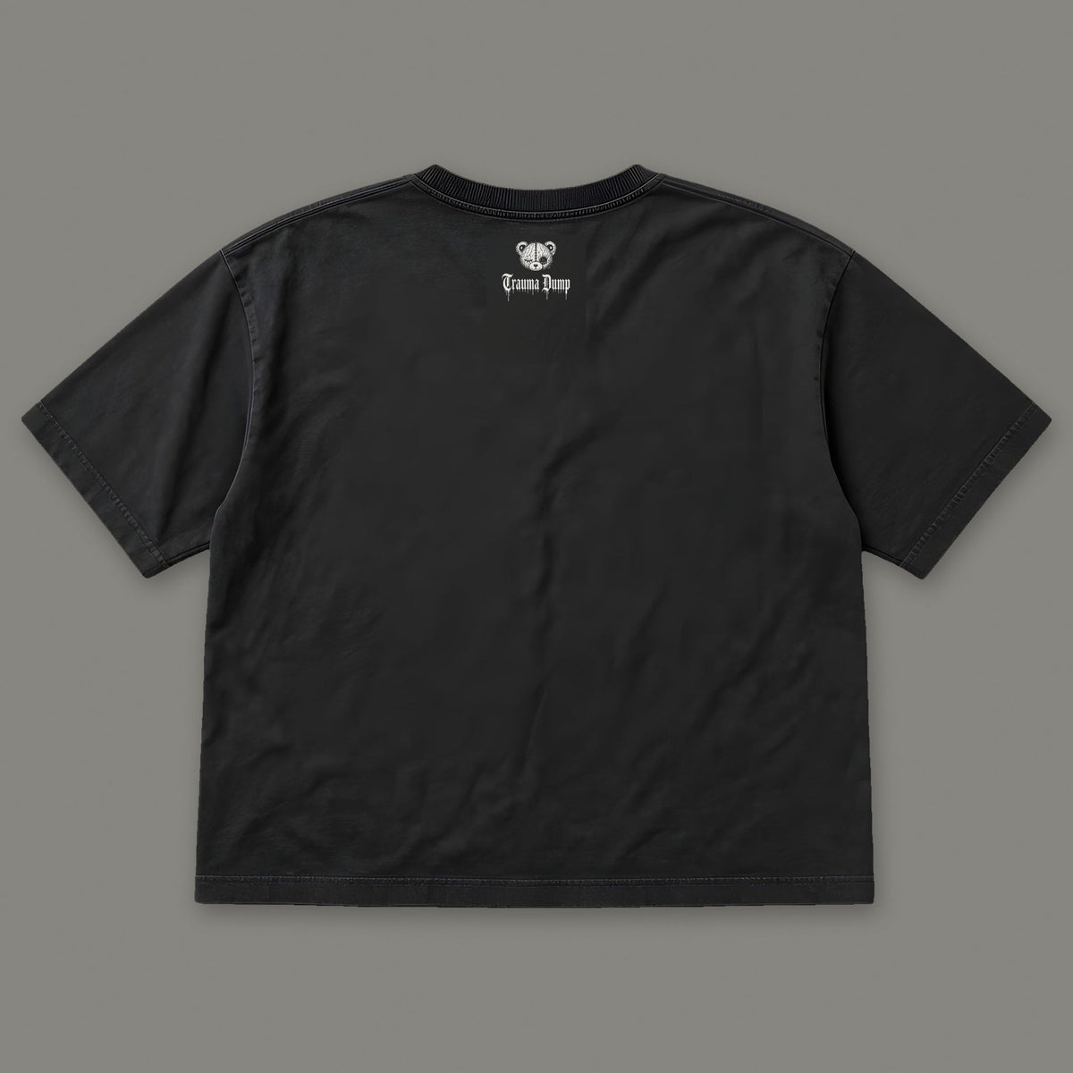 Inner Child Women's Boxy Tee by Trauma Dump, women's boxy goth tee back view with Trauma Dump bear-head logo under the collar