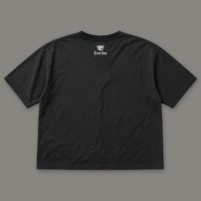 Inner Child Women's Boxy Tee by Trauma Dump, women's boxy goth tee back view with Trauma Dump bear-head logo under the collar