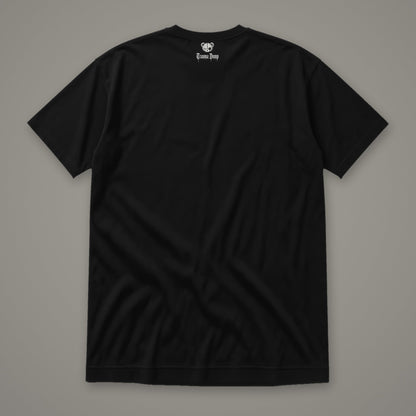 Inner Child Women's Relaxed Tee by Trauma Dump, women's relaxed tee back view with Trauma Dump bear-head logo under the collar (Black, white ink)