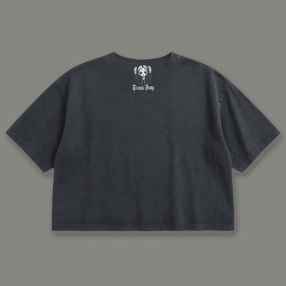 Life is Fragile Cropped Baby Tee in black, back view with doll portrait logo under the collar