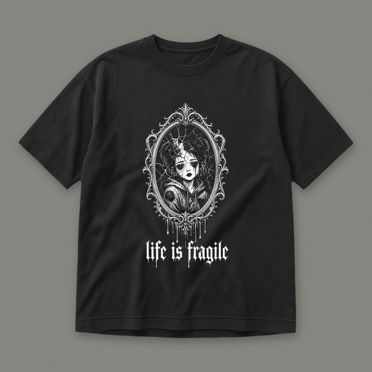 Life is Fragile Men's Heavyweight Tee in black by Trauma Dump, cracked mirror tattoo-style gothic graphic (Black, white ink)