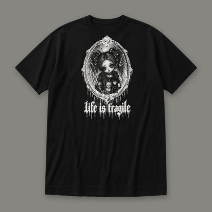 Life is Fragile Women's Relaxed Tee in black by Trauma Dump, white-ink print of young Wren in a cracked oval mirror frame with dripping "life is fragile" lettering (Black, white ink)