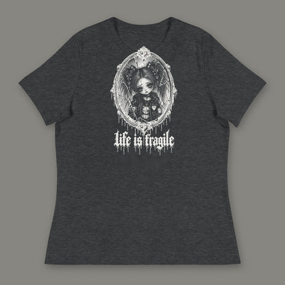 Life is Fragile Women's Relaxed Tee in dark grey heather by Trauma Dump, white-ink print of young Wren in a cracked oval mirror frame with dripping "life is fragile" lettering (Dark Grey Heather, white ink)