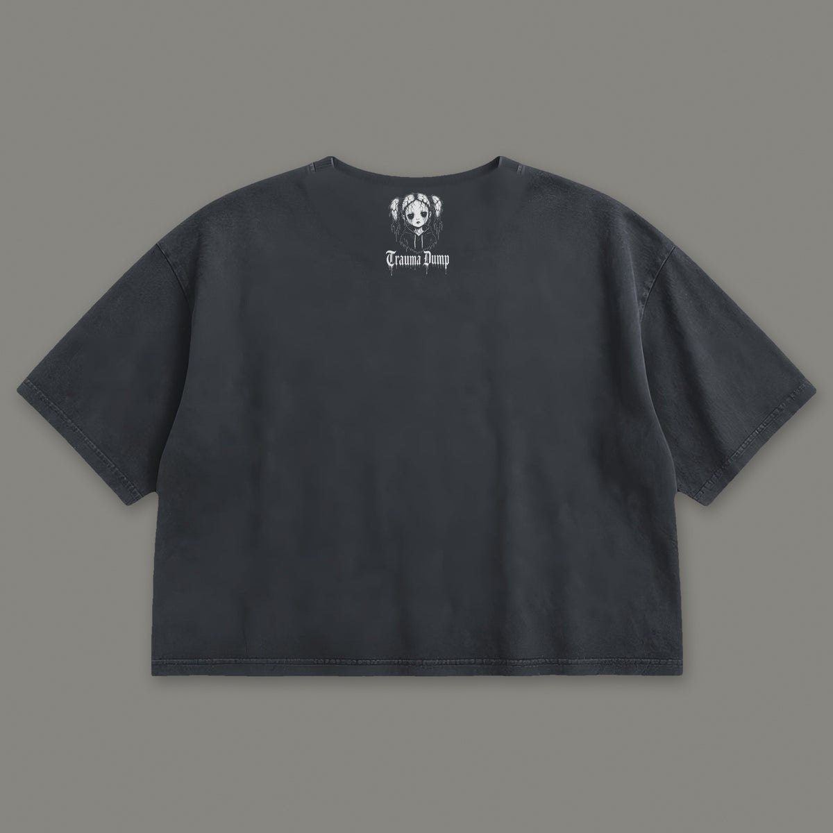 Love Language Cropped Baby Tee in black, back view with doll portrait logo under the collar