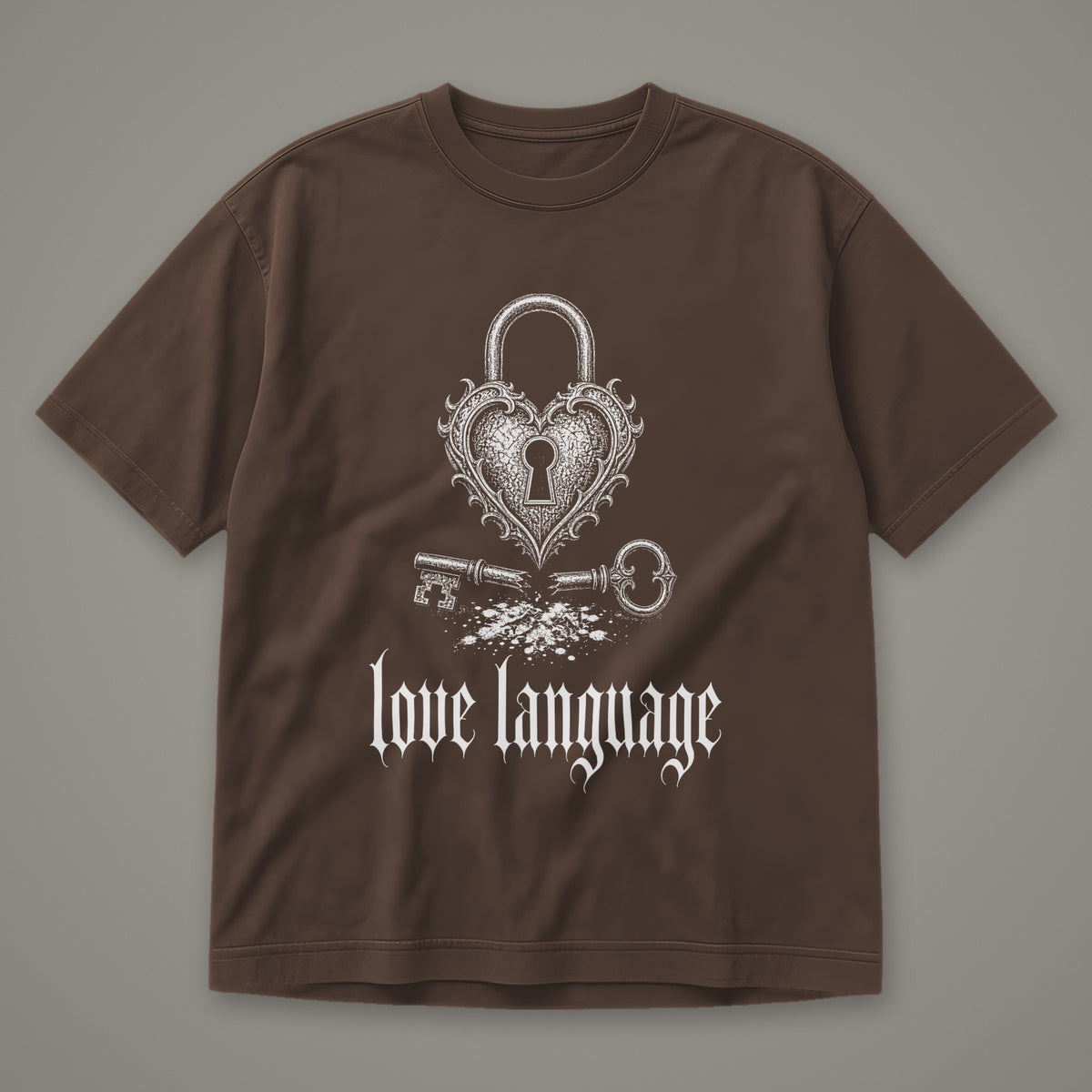 Love Language Men's Heavyweight Tee in espresso by Trauma Dump, heart padlock and broken key tattoo-style gothic graphic in white ink (Espresso, white ink)