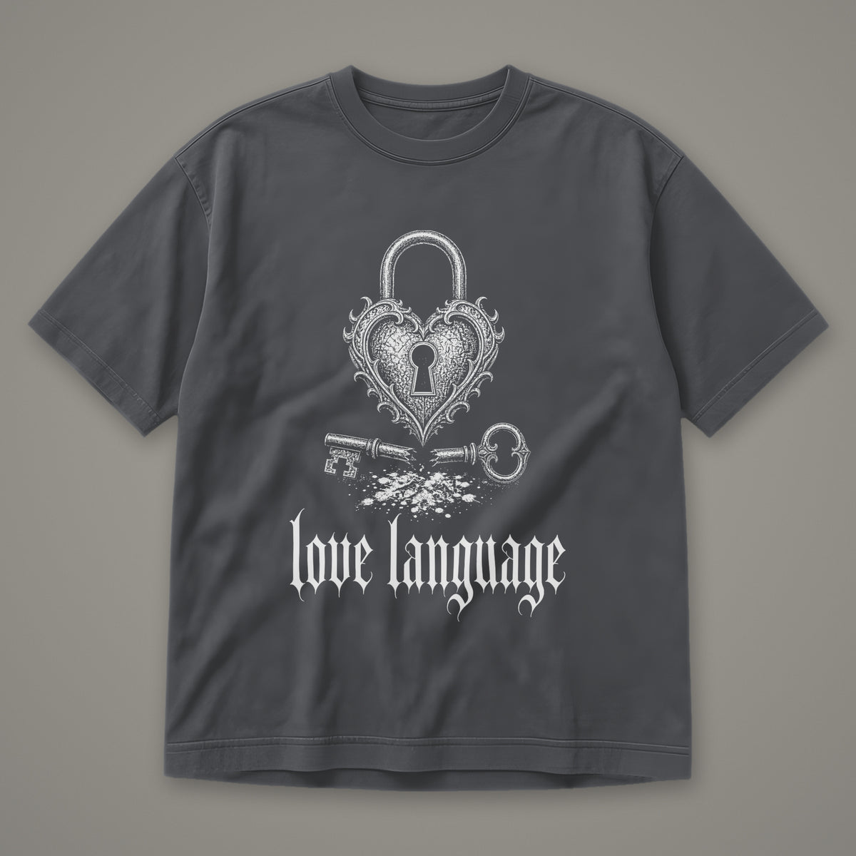 Love Language Men's Heavyweight Tee in graphite by Trauma Dump, heart padlock and broken key tattoo-style gothic graphic in white ink (Graphite, white ink)