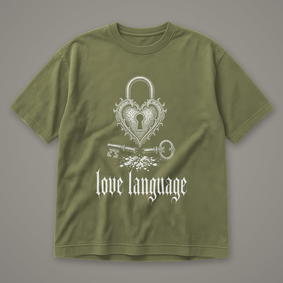 Love Language Men's Heavyweight Tee in moss by Trauma Dump, heart padlock and broken key tattoo-style gothic graphic in white ink (Moss, white ink)