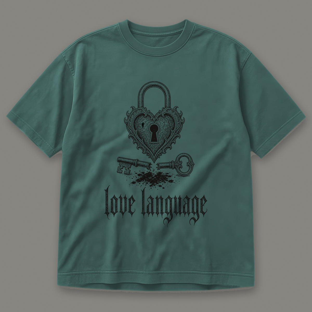 Love Language Men's Heavyweight Tee in blue spruce by Trauma Dump, heart padlock and broken key tattoo-style gothic graphic in black ink (Blue Spruce, black ink)