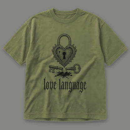 Love Language Men's Heavyweight Tee in moss by Trauma Dump, heart padlock and broken key tattoo-style gothic graphic in black ink (Moss, black ink)