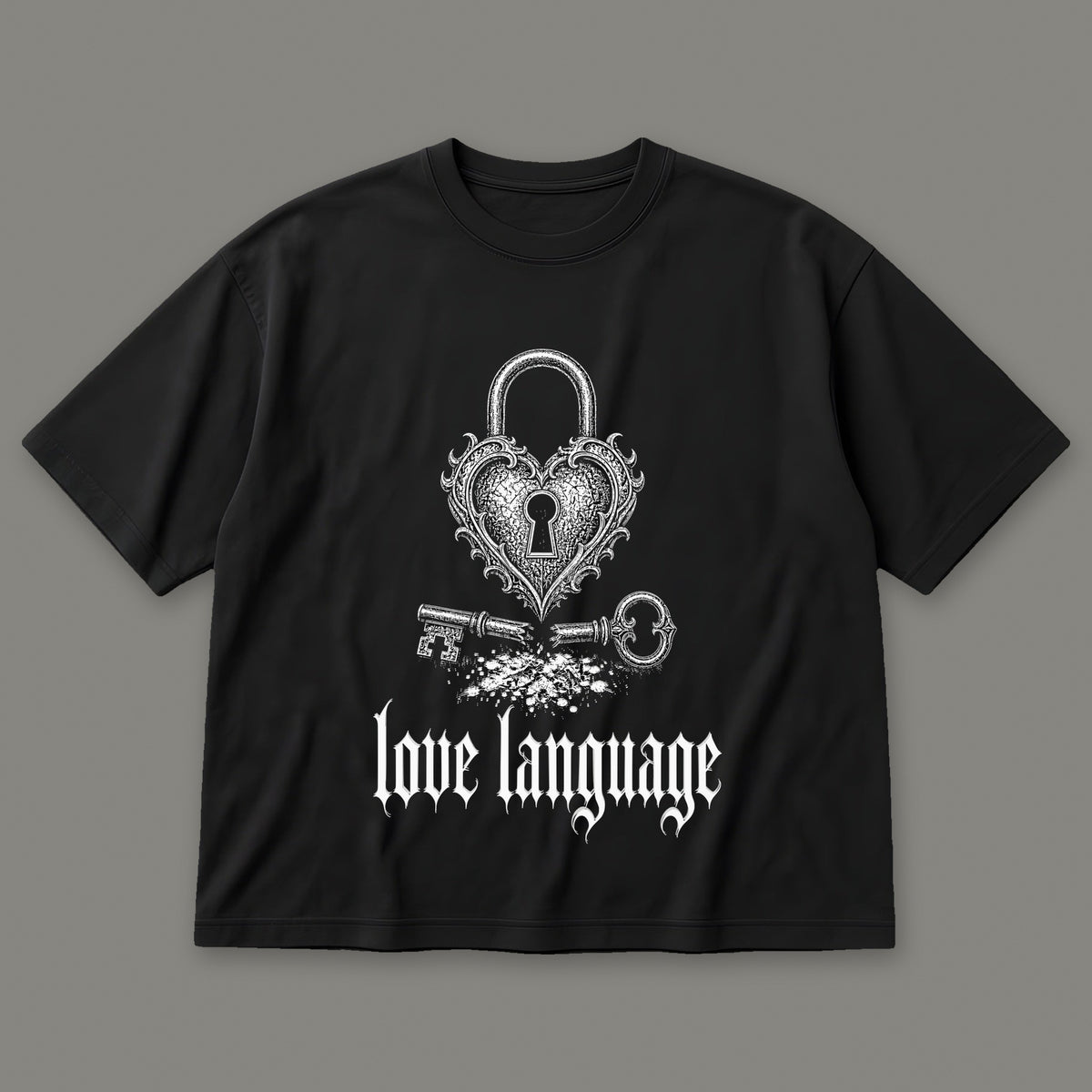 Love Language Men's Oversized Tee in black by Trauma Dump, heart padlock and broken key tattoo-style gothic graphic