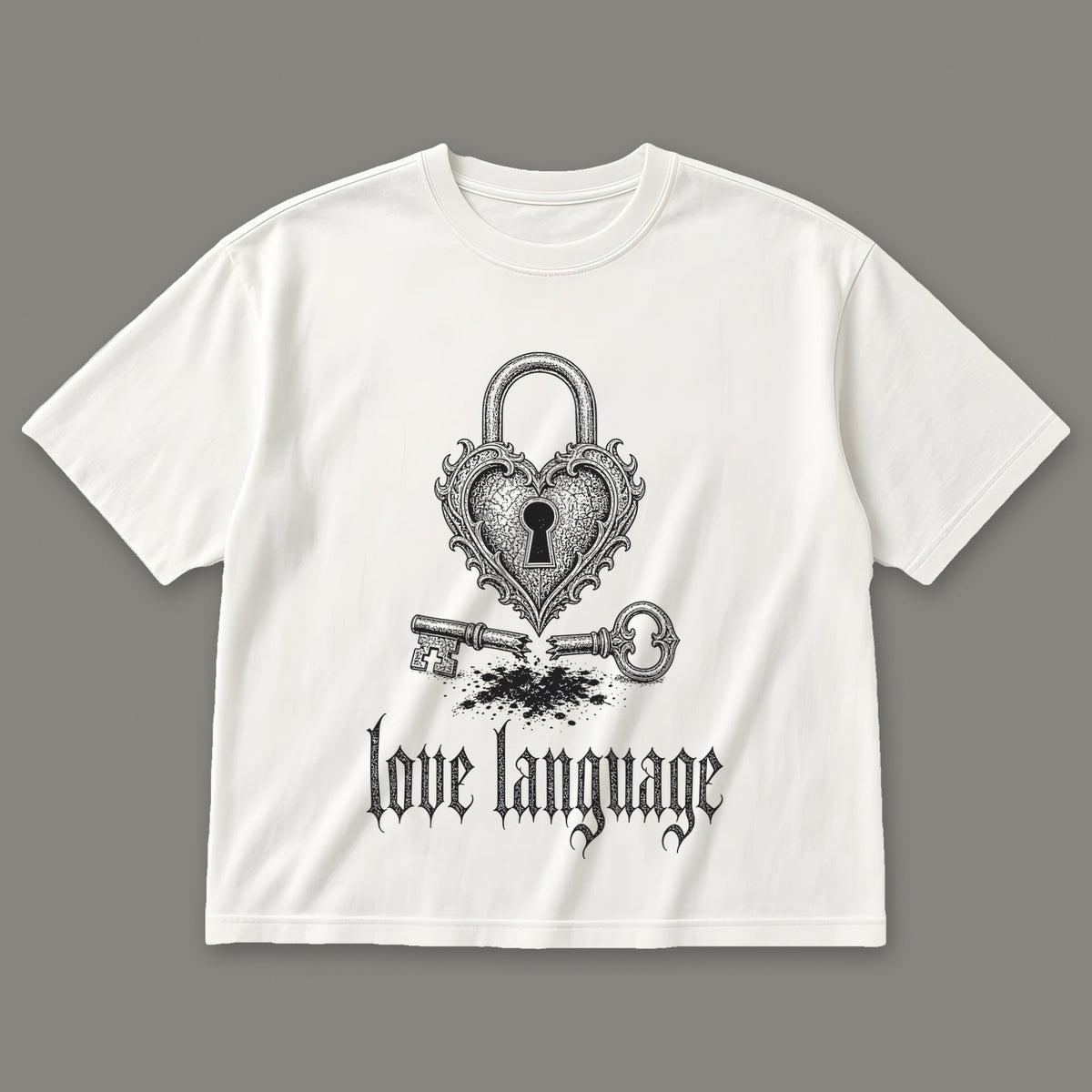 Love Language Women's Boxy Tee in white by Trauma Dump, heart padlock and broken key tattoo-style gothic graphic in black ink