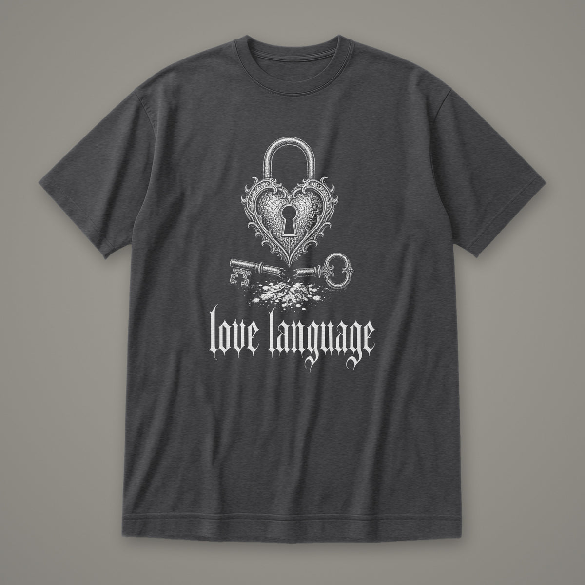 Love Language Women's Relaxed Tee in dark grey heather by Trauma Dump, heart padlock and broken key tattoo-style gothic graphic in white ink (Dark Grey Heather, white ink)