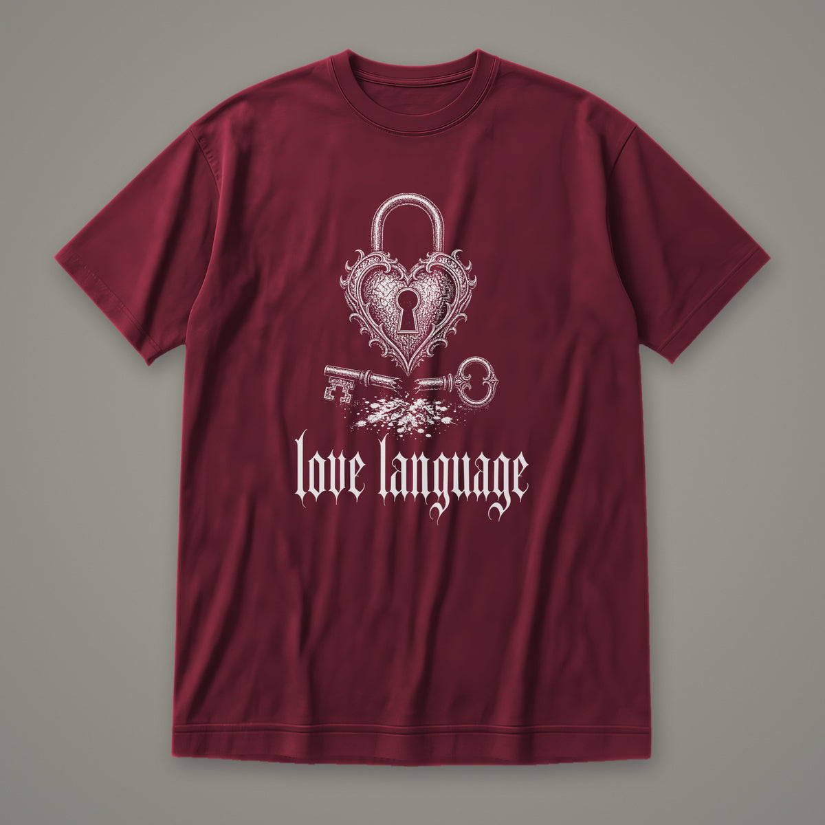 Love Language Women's Relaxed Tee in maroon by Trauma Dump, heart padlock and broken key tattoo-style gothic graphic in white ink (Maroon, white ink)