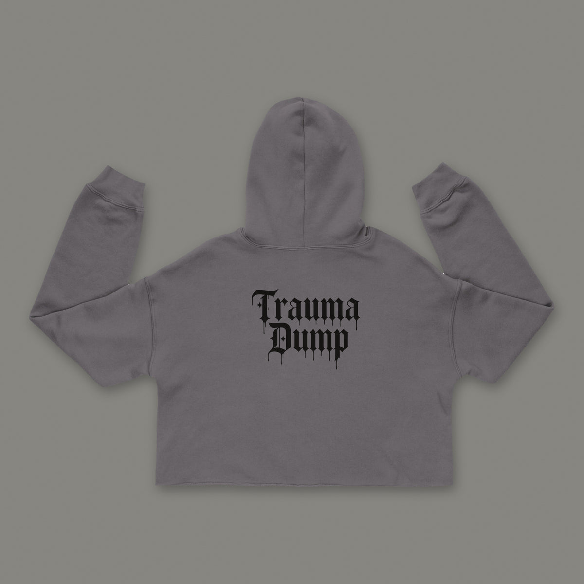 People Pleaser Cropped Hoodie by Trauma Dump, storm grey goth cropped hoodie back with Trauma Dump gothic logo in black ink (Storm, black ink)