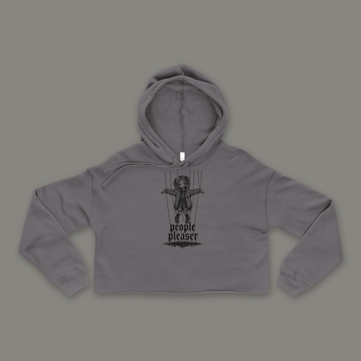 People Pleaser Cropped Hoodie in storm by Trauma Dump, storm grey goth cropped hoodie front with cut-strings marionette print in black ink (Storm, black ink)