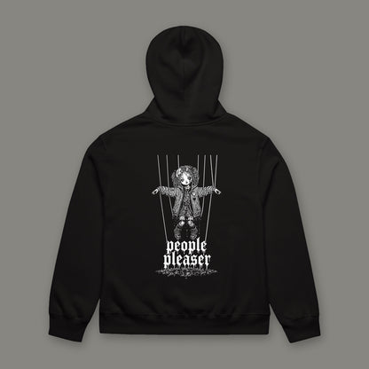 People Pleaser Oversized Heavyweight Hoodie in black by Trauma Dump, oversized black goth hoodie back with cut-strings marionette print in white ink (Black, white ink)