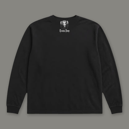 People Pleaser Long Sleeve Tee in black, back view with doll portrait logo under the collar (Black, white ink)