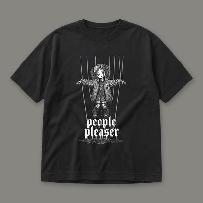People Pleaser Men's Heavyweight Tee in black by Trauma Dump, cut-string marionette tattoo-style gothic graphic in white ink (Black, white ink)