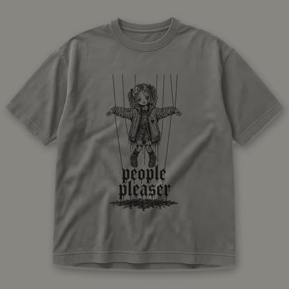 People Pleaser Men's Heavyweight Tee in pepper by Trauma Dump, cut-string marionette tattoo-style gothic graphic in black ink (Pepper, black ink)