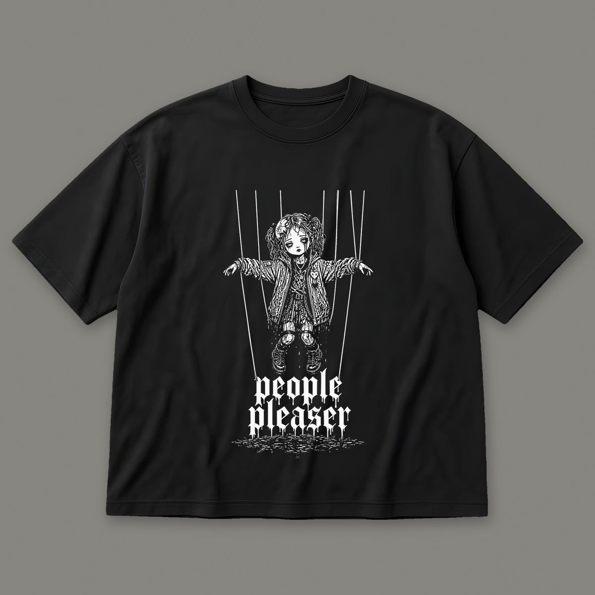 People Pleaser Men's Oversized Tee in black by Trauma Dump, cut-string marionette tattoo-style gothic graphic