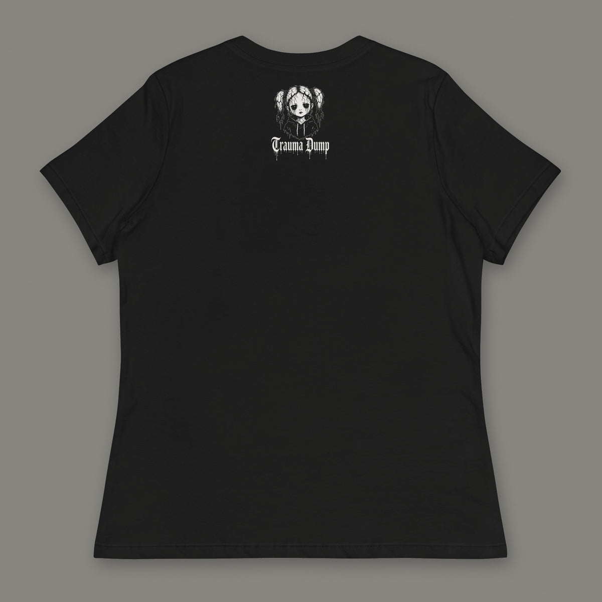 People Pleaser Women's Relaxed Tee in black by Trauma Dump, women's relaxed tee goth tee back view with TD doll logo under the collar in white ink (Black, White ink)