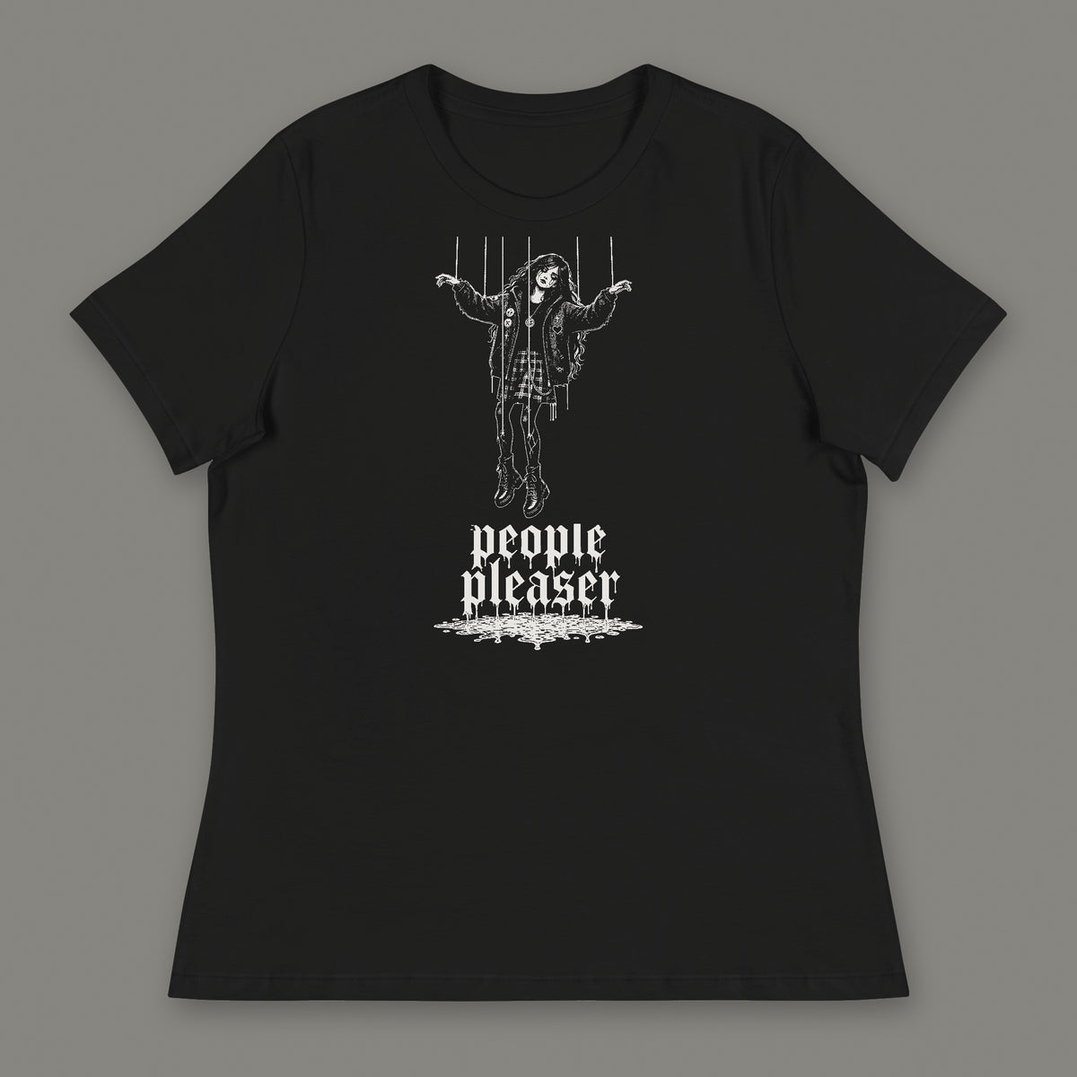 People Pleaser Women's Relaxed Tee in black by Trauma Dump, cut-string marionette tattoo-style gothic graphic in white ink (Black, white ink)