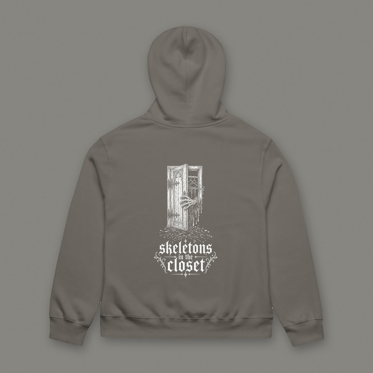 Skeletons in the Closet Oversized Heavyweight Hoodie by Trauma Dump, oversized goth hoodie with skeleton hand print, mockup view 3 (Asphalt, white ink)