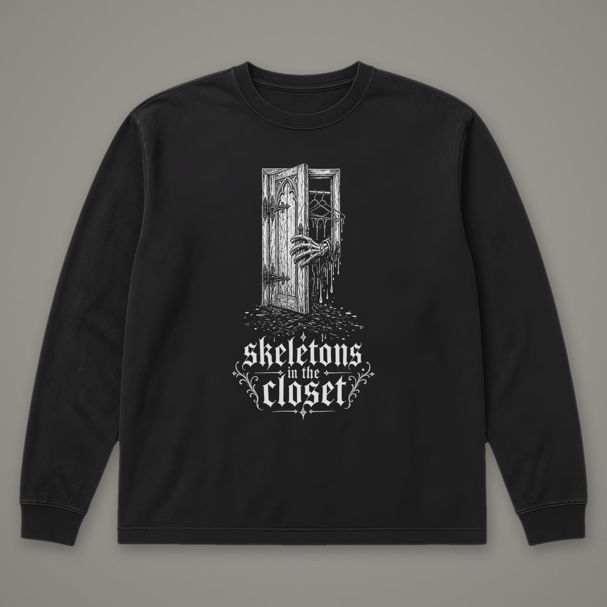 Skeletons in the Closet Long Sleeve Tee in black, front view (Black, white ink)
