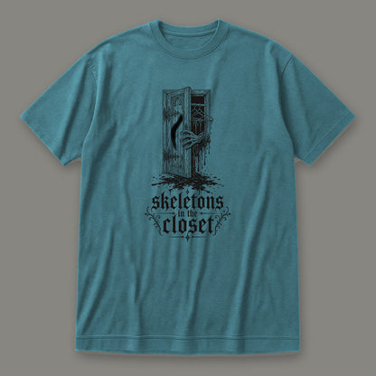 Skeletons in the Closet Women's Relaxed Tee in heather deep teal by Trauma Dump, skeleton hand in a closet door tattoo-style gothic graphic in black ink (Heather Deep Teal, black ink)