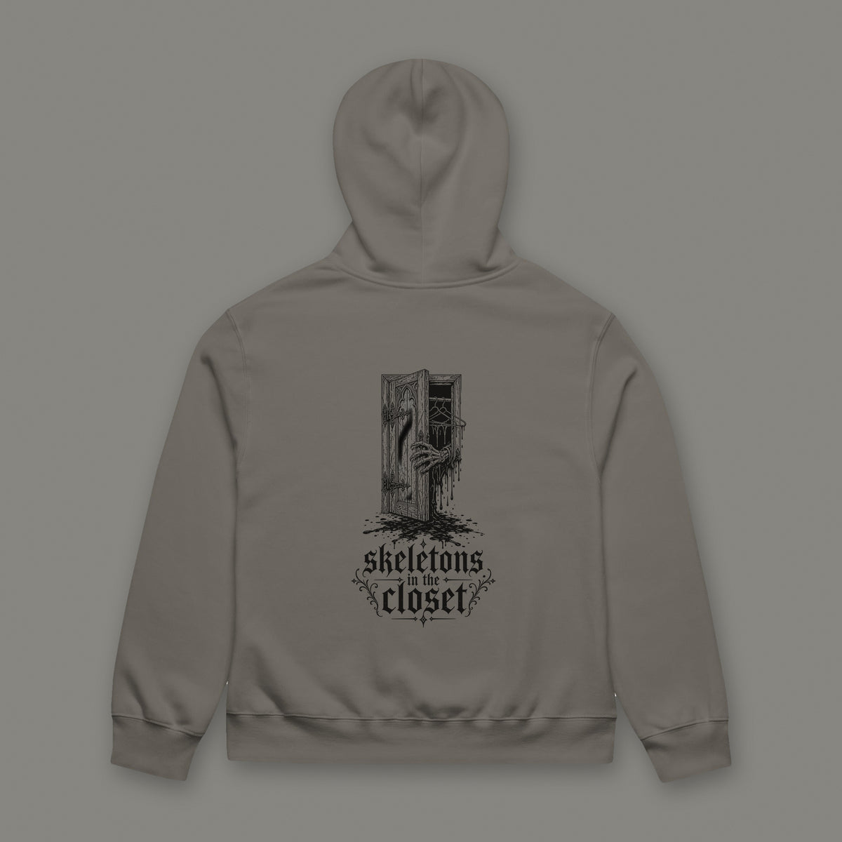 Skeletons in the Closet Oversized Heavyweight Hoodie in asphalt by Trauma Dump, oversized asphalt goth hoodie back with skeleton hand print in black ink (Asphalt, black ink)