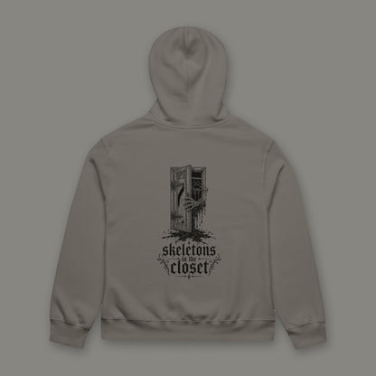 Skeletons in the Closet Oversized Heavyweight Hoodie in asphalt by Trauma Dump, oversized asphalt goth hoodie back with skeleton hand print in black ink (Asphalt, black ink)