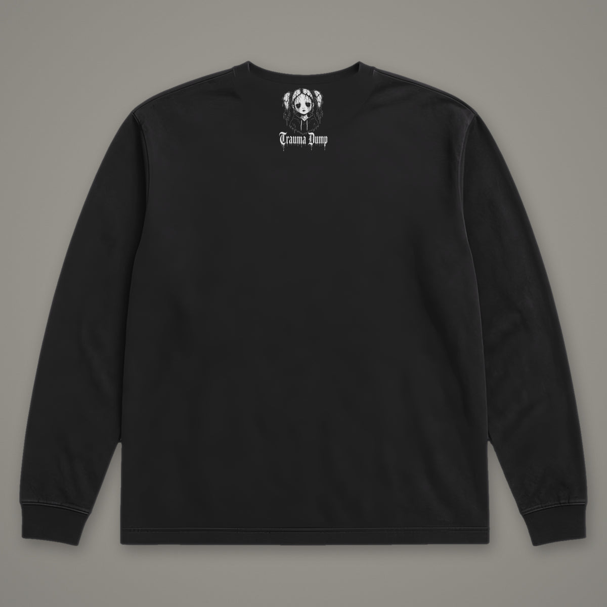 Trauma Dump Long Sleeve Tee in black, back view with doll portrait logo under the collar