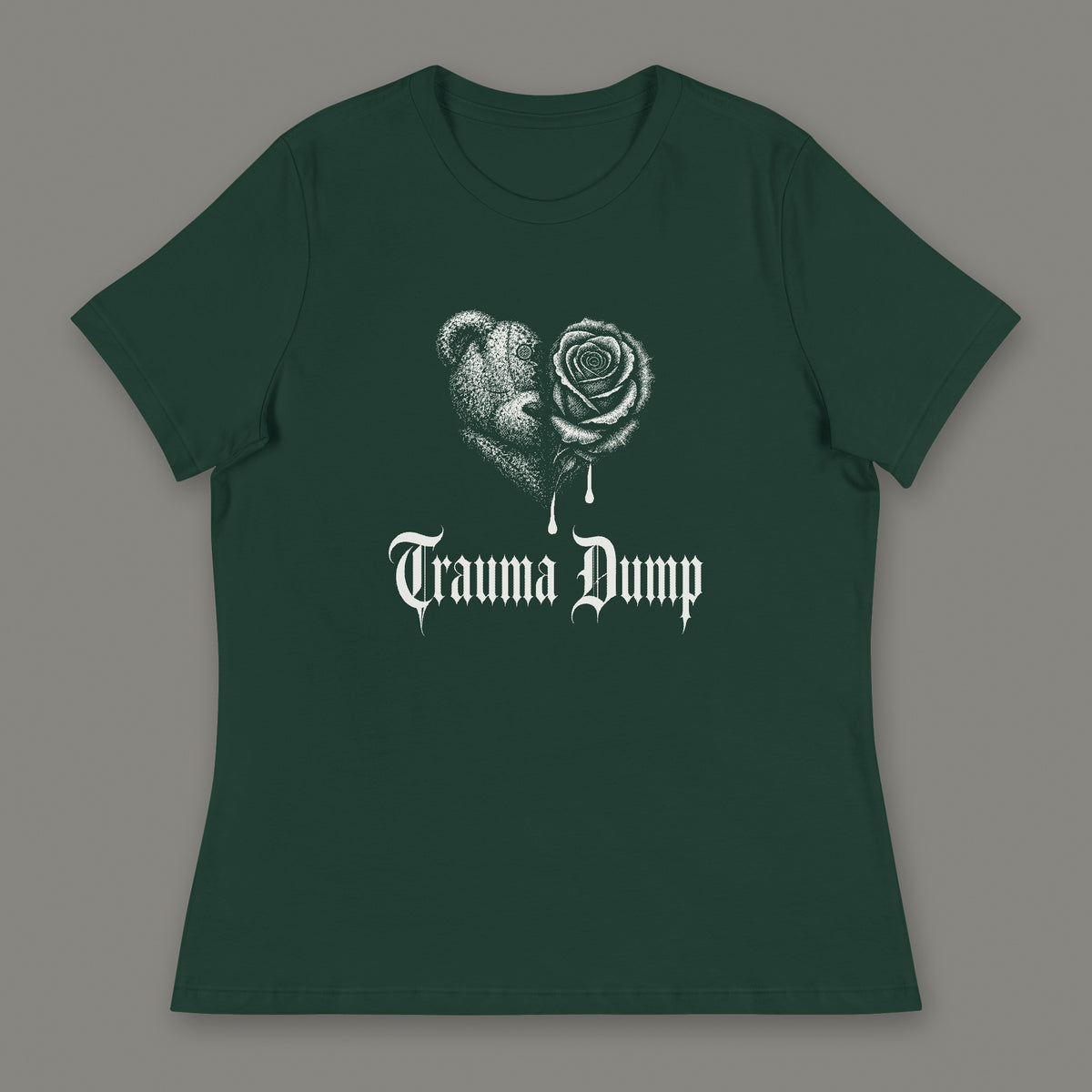 Trauma Dump Women's Relaxed Tee in forest green by Trauma Dump, dripping broken heart tattoo-style gothic graphic in white ink (Forest Green, white ink)