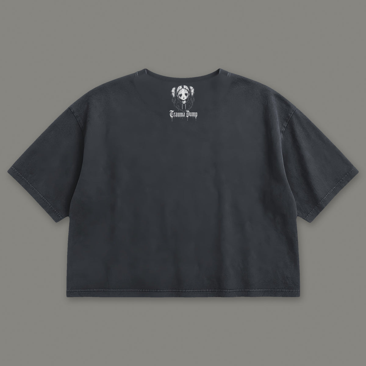 Wallflower Cropped Baby Tee in black, back view with doll portrait logo under the collar