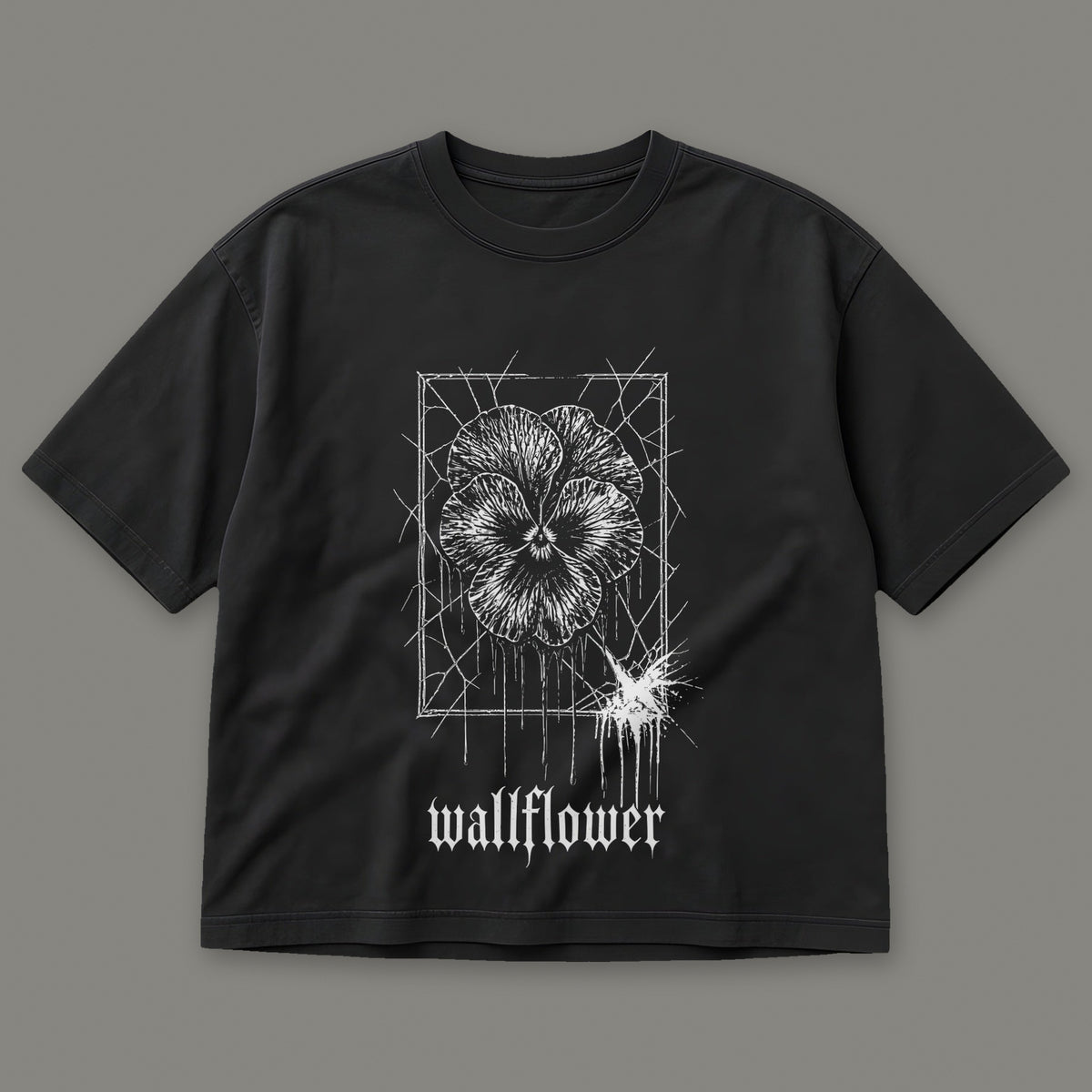 Wallflower Women's Boxy Tee in black by Trauma Dump, pressed flower tattoo-style gothic graphic (Black, white ink)