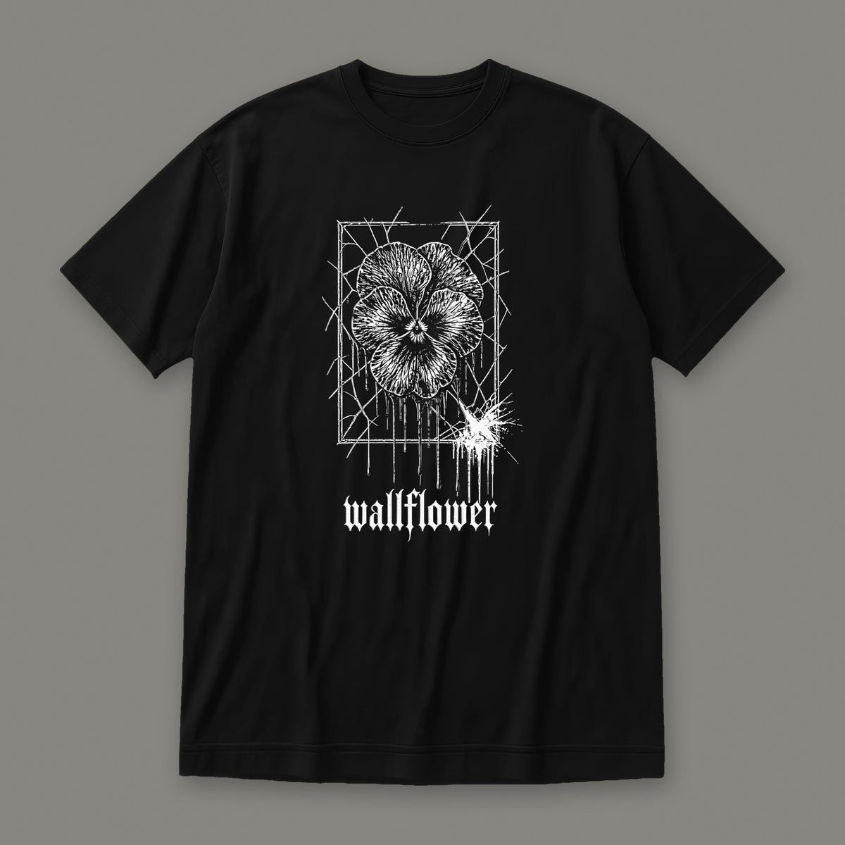 Wallflower Women's Relaxed Tee in black by Trauma Dump, pressed flower tattoo-style gothic graphic in white ink (Black, white ink)