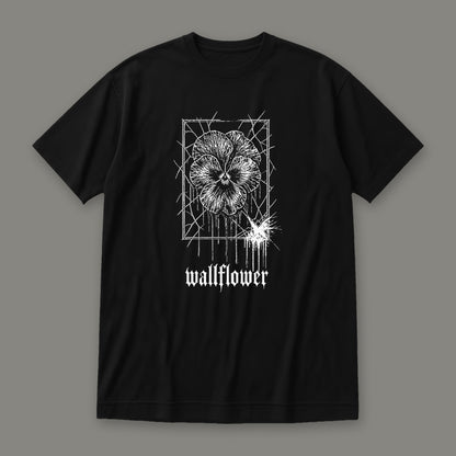 Wallflower Women's Relaxed Tee in black by Trauma Dump, pressed flower tattoo-style gothic graphic (Black, white ink)